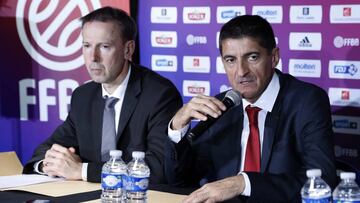 French Head coach Vincent collet (L) and President of the French basketball Federation Jean-Pierre Siutat (R) hold a press conference in Paris, on May 2 2015, to announce the France Team composition for the Eurobasket 2015. AFP PHOTO / THOMAS SAMSON