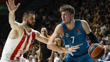 BELGRADE, SERBIA - MARCH 30: Luka Doncic (R) of Real Madrid in action against Branko Lazic (L) of Crvena zvezda during the 2017/2018 Turkish Airlines EuroLeague Regular Season game between Crvena Zvezda mts Belgrade and Real Madrid at Aleksandar Nikolic H