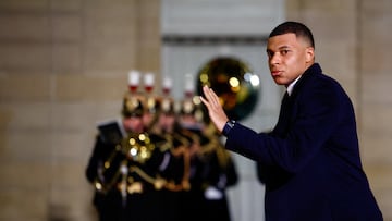 Paris St Germain professional football player Kylian Mbappe gestures as he arrives to attend a state dinner organised by French President Emmanuel Macron and his wife Brigitte Macron for Qatar's Emir Sheikh Tamim bin Hamad Al Thani at the Elysee Palace in Paris, France, February 27, 2024. REUTERS/Sarah Meyssonnier