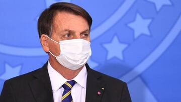 Brazilian President Jair Bolsonaro attends the launch of the Rural Women's Rights program at Planalto Palace in Brasilia, on July 29, 2020. - This is the first public appearance of Bolsonaro in an official event after he tested negative for COVID-19 coronavirus. (Photo by EVARISTO SA / AFP)