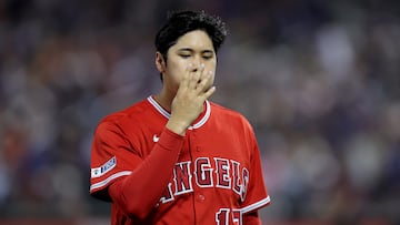 Aug 25, 2023; New York City, New York, USA; Los Angeles Angels designated hitter Shohei Ohtani (17) blows on his fingers as he walks off the field after the top of the fifth inning against the New York Mets at Citi Field. Mandatory Credit: Brad Penner-USA TODAY Sports