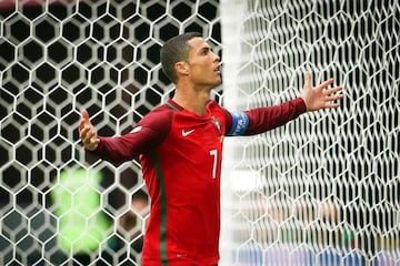 Cristiano, arms outstretched, celebrates his opener for Portugal