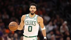 PHOENIX, ARIZONA - DECEMBER 07: Jayson Tatum #0 of the Boston Celtics handles the ball during the first half of the NBA game against the Phoenix Suns at Footprint Center on December 07, 2022 in Phoenix, Arizona. NOTE TO USER: User expressly acknowledges and agrees that, by downloading and or using this photograph, User is consenting to the terms and conditions of the Getty Images License Agreement.   Christian Petersen/Getty Images/AFP (Photo by Christian Petersen / GETTY IMAGES NORTH AMERICA / Getty Images via AFP)