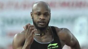 Asafa Powell, en plena carrera.