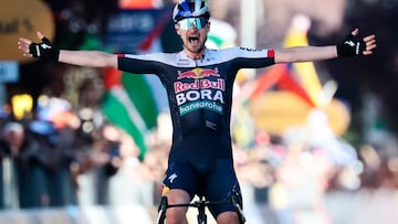 Red Bull-Bora-Hansgrohe's Germany rider Nico Denz celebrates after victory as he crosses the finish of the 18th stage of the 108th Giro d'Italia cycling race of 144kms from Morbegno to Cesano Maderno on May 29, 2025. (Photo by Luca Bettini / AFP)
