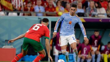 AL RAYYAN, QATAR - DECEMBER 6: Romain Saiss of Morocco, Ferran Torres of Spain  during the  World Cup match between Morocco  v Spain at the Education City Stadium on December 6, 2022 in Al Rayyan Qatar (Photo by David S. Bustamante/Soccrates/Getty Images)