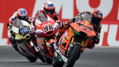 MotoGP - TT Assen - TT Circuit Assen, Assen, Netherlands - June 26, 2022 Red Bull KTM Ajo's Augusto Fernandez, GasGas Aspar Team's Jake Dixon and Idemitsu Honda Team Asia's Ai Ogura in action during the Moto2 race REUTERS/Piroschka Van De Wouw