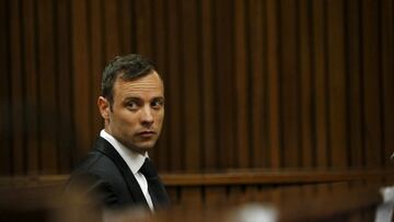 FILE PHOTO: Oscar Pistorius sits in the dock at the North Gauteng High Court in Pretoria, South Africa for a bail hearing, December 8, 2015. REUTERS/Siphiwe Sibeko/File Photo
