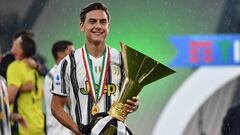 TURIN, ITALY - AUGUST 01:  Paulo Dybala of Juventus FC celebrates with the trophy after the Serie A match between Juventus and  AS Roma at Allianz Stadium on August 1, 2020 in Turin, Italy.  (Photo by Valerio Pennicino/Getty Images)