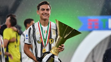 TURIN, ITALY - AUGUST 01: Paulo Dybala of Juventus FC celebrates with the trophy after the Serie A match between Juventus and AS Roma at Allianz Stadium on August 1, 2020 in Turin, Italy. (Photo by Valerio Pennicino/Getty Images)