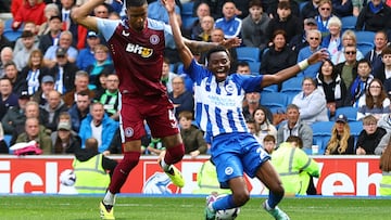 Soccer Football - Premier League - Brighton & Hove Albion v Aston Villa - The American Express Community Stadium, Brighton, Britain - May 5, 2024 Aston Villa's Ezri Konsa concedes a penalty against Brighton & Hove Albion's Simon Adingra Action Images via Reuters/Matthew Childs NO USE WITH UNAUTHORIZED AUDIO, VIDEO, DATA, FIXTURE LISTS, CLUB/LEAGUE LOGOS OR 'LIVE' SERVICES. ONLINE IN-MATCH USE LIMITED TO 45 IMAGES, NO VIDEO EMULATION. NO USE IN BETTING, GAMES OR SINGLE CLUB/LEAGUE/PLAYER PUBLICATIONS.