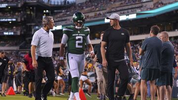 Zach Wilson of the New York Jets walks to the locker room after an injury against the Philadelphia Eagles.