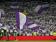 Real Madrid fans cheer before the Spanish league football match between Real Madrid CF and Getafe CF at Santiago Bernabeu Stadium in Madrid on March 2, 2026. (Photo by Javier SORIANO / AFP)