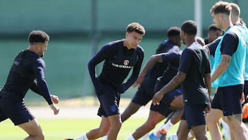 Alli back in England training