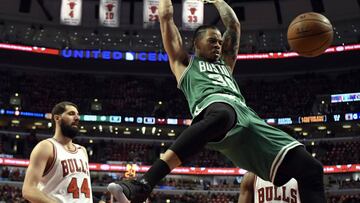 Apr 28, 2017; Chicago, IL, USA; Boston Celtics forward Gerald Green (30) dunks the ball as Chicago Bulls forward Nikola Mirotic (44) looks on during the first quarter in game six of the first round of the 2017 NBA Playoffs at United Center. Mandatory Credit: David Banks-USA TODAY Sports