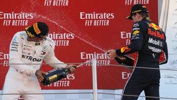 Formula One F1 - Spanish Grand Prix - Circuit de Barcelona-Catalunya, Barcelona, Spain - May 12, 2019 First placed Mercedes&#039; Lewis Hamilton and third placed Red Bull&#039;s Max Verstappen on the podium. REUTERS/Jon Nazca