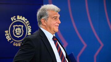 FC Barcelona's President Joan Laporta attends a press conference at the Ciudad Deportiva Joan Gamper in Sant Joan Despi, near Barcelona, on January 14, 2025. Dani Olmo's future at Barcelona remains in the balance as the Catalan club pursue their legal battle to get the midfielder registered to play once more. FC Barcelona's failure to meet La Liga's budgetary rules to license both Olmo and forward Pau Victor before the end of last year currently leaves them ineligible to play for the rest of the season. (Photo by Josep LAGO / AFP)