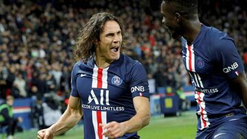 Paris Saint-Germain's Uruguayan forward Edinson Cavani (L) and Paris Saint-Germain's Senegalese midfielder Idrissa Gueye celebrate after a goal during the French L1 football match between Paris Saint-Germain (PSG) and Lyon (OL) at the Parc des P