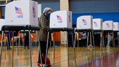 People vote at Morgan State University, on the second day of early voting in the US presidential race, in Baltimore, Maryland on October 27, 2020. (Photo by Andrew CABALLERO-REYNOLDS / AFP)