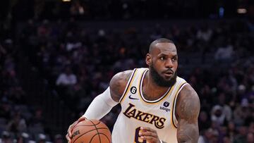 Los Angeles Lakers forward LeBron James (6) dribbles the ball against the Sacramento Kings in the third quarter at the Golden 1 Center.