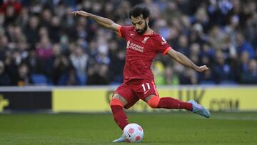 Soccer Football - Premier League - Brighton & Hove Albion v Liverpool - The American Express Community Stadium, Brighton, Britain - March 12, 2022 Liverpool's Mohamed Salah scores their second goal from the penalty spot REUTERS/Tony Obrien EDITOR