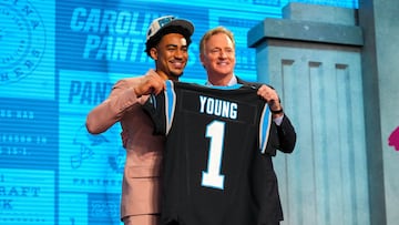 Alabama quarterback Bryce Young with NFL commissioner Roger Goodell after he was drafted first overall by the Carolina Panthers in the first round of the 2023 NFL Draft.