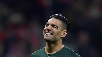 Monaco's Colombian forward Radamel Falcao reacts after missing a penalty kick during the UEFA Champions League group A football match between Atletico Madrid and Monaco at the Wanda Metropolitan stadium in Madrid on November 28, 2018. (Photo by OSCAR