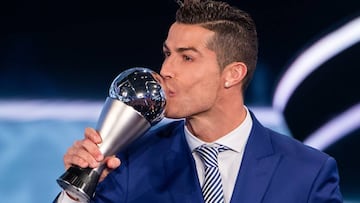 ZURICH, SWITZERLAND - JANUARY 09: The Best FIFA Men&#039;s Player Award winner Cristiano Ronaldo of Portugal and Real Madrid kisses the trophy during The Best FIFA Football Awards 2016 on January 9, 2017 in Zurich, Switzerland. (Photo by Philipp Schmidli/Getty Images)