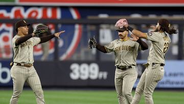 NEW YORK, NEW YORK - MAY 26: Juan Soto #22,Trent Grisham #1 and Fernando Tatis Jr. #23 of the San Diego Padres celebrate the win over the New York Yankees at Yankee Stadium on May 26, 2023 in Bronx borough of New York City. The San Diego Padres defeated the New York Yankees 5-1.   Elsa/Getty Images/AFP (Photo by ELSA / GETTY IMAGES NORTH AMERICA / Getty Images via AFP)