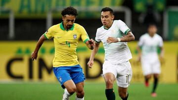 Soccer Football - World Cup 2022 South American Qualifiers - Brazil v Bolivia - Arena Corinthians, Sao Paulo, Brazil - October 9, 2020 Brazil's Marquinhos in action with Bolivia's Bruno Miranda Buda Mendes/Pool via Reuters