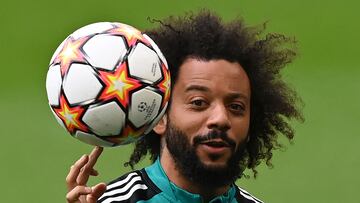 (FILES) In this file photo taken on April 5, 2022, Real Madrid's Brazilian defender Marcelo takes part in a training session at Stamford Bridge in London, on the eve of the of their UEFA Champions League first leg quarter-final football match against Chelsea. - Brazilian international Marcelo, five-time European champion with Real Madrid, signed with Fluminense, his boyhood club announced on February 24, 2023. The 34-year-old left-back "has signed a contract until December 2024, with an option for an extension until the end of 2025," the Rio de Janeiro club said in a statement. (Photo by Glyn KIRK / AFP)