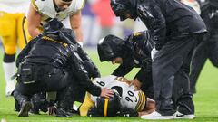 BALTIMORE, MARYLAND - JANUARY 06: T.J. Watt #90 of the Pittsburgh Steelers is looked at by medical staff after an injury during the second half of a game against the Baltimore Ravens at M&T Bank Stadium on January 06, 2024 in Baltimore, Maryland.   Rob Carr/Getty Images/AFP (Photo by Rob Carr / GETTY IMAGES NORTH AMERICA / Getty Images via AFP)