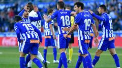 Alaves&#039; Spanish forward Borja Baston (C) celebrates with teammates after scoring a goal during the Spanish League football match between Deportivo Alaves and Valencia CF at the Mendizorroza stadium in Vitoria on January 5, 2019. (Photo by ANDER GILLE