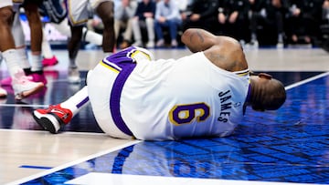 Feb 26, 2023; Dallas, Texas, USA; Los Angeles Lakers forward LeBron James (6) lays on the floor injured during the second half against the Dallas Mavericks at American Airlines Center. Mandatory Credit: Kevin Jairaj-USA TODAY Sports