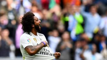 Real Madrid&#039;s Brazilian defender Marcelo celebrates after scoring during the Spanish league football match Real Madrid CF against Levante UD at the Santiago Bernabeu stadium in Madrid on October 20, 2018. (Photo by GABRIEL BOUYS / AFP)