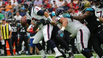 Football- NFL - Houston Texans vs Jacksonville Jaguars - Houston- September 10, 2017 - Texans quarteback Tom Savage is sacked bu Jaguars Calais Campbell . REUTERS/Mike Blake
