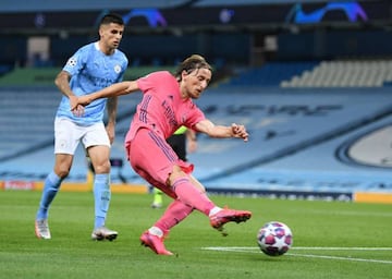 Modric in action against Man City.