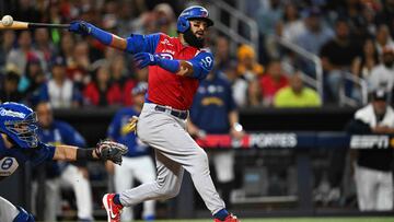 Dominican Republic's outfielder #01 Emilio Bonifacio swings his bat during the Caribbean Series baseball championship game between the Dominican Republic and Venezuela at LoanDepot Park in Miami, Florida, on February 9, 2024. (Photo by Chandan Khanna / AFP)