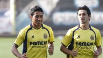 Aquino (dcha.), junto a Pereira.