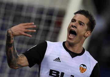 Santi Mina celebrates scoring Valencia's second at Espanyol on Sunday.