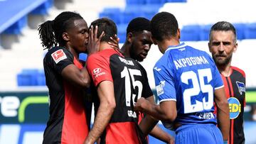 Soccer Football - Bundesliga - TSG 1899 Hoffenheim v Hertha BSC - PreZero Arena, Sinsheim, Germany - May 16, 2020 Hertha Berlin&#039;s Dedryck Boyata with Marko Grujic, as play resumes behind closed doors following the outbreak of the coronavirus disease 