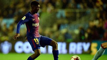 Barcelona's French forward Ousmane Dembele kicks the ball during the Spanish Copa del Rey (King's Cup) football match RC Celta de Vigo vs FC Barcelona at the Balaidos stadium in Vigo on January 4, 2018. / AFP PHOTO / MIGUEL RIOPA