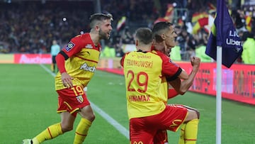 Soccer Football - Ligue 1 - RC Lens v Olympique Lyonnais - Stade Bollaert-Delelis, Lens, France - October 2, 2022 RC Lens' Florian Sotoca celebrates scoring their first goal with teammates REUTERS/Pascal Rossignol