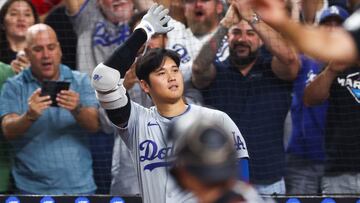 MIAMI, FLORIDA - SEPTEMBER 19: Shohei Ohtani #17 of the Los Angeles Dodgers celebrates after hitting a two-run home run, his 50th of the season, during the seventh inning against the Miami Marlins at loanDepot park on September 19, 2024 in Miami, Florida. Ohtani is now the first MLB player to have at least 50 home runs and 50 stolen bases in the same season. Megan Briggs/Getty Images/AFP (Photo by Megan Briggs / GETTY IMAGES NORTH AMERICA / Getty Images via AFP)