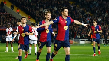 Soccer Football - LaLiga - FC Barcelona v Rayo Vallecano - Estadi Olimpic Lluis Companys, Barcelona, Spain - February 17, 2025 FC Barcelona's Robert Lewandowski celebrates scoring their first goal with teammates REUTERS/Albert Gea