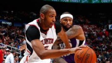 Al Horford y DeMarcus Cousins.