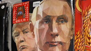 T-shirts with images of Russian President Vladimir Putin and U.S. President Donald Trump are displayed for sale at a gift shop in central Moscow, Russia, August 12, 2025. REUTERS/Yulia Morozova