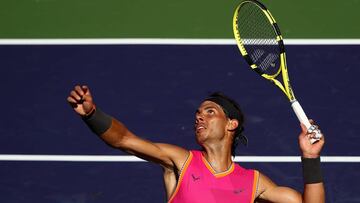 INDIAN WELLS, CALIFORNIA - MARCH 12: Rafael Nadal of Spain serves against Diego Schwartzman of Argentina during their men&#039;s singles third round match on day nine of the BNP Paribas Open at the Indian Wells Tennis Garden on March 12, 2019 in Indian Wells, California.   Clive Brunskill/Getty Images/AFP
 == FOR NEWSPAPERS, INTERNET, TELCOS &amp; TELEVISION USE ONLY ==