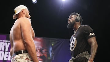 LOS ANGELES, CALIFORNIA - JUNE 15: Tyson Fury and Deontay Wilder face off during the press conference at The Novo by Microsoft at L.A. Live on June 15, 2021 in Los Angeles, California.   Meg Oliphant/Getty Images/AFP
 == FOR NEWSPAPERS, INTERNET, TELCOS &