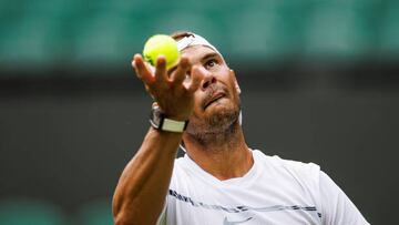 LONDON, ENGLAND - JUNE 23: Rafael Nadal of Spain practices on centre court at the AELTC with coaches Francisco Roig and Marc Lopez in a historic first time ever use of centre court for a singles player practice session before the start of The Championships Wimbledon 2022 at All England Lawn Tennis and Croquet Club on June 23, 2022 in London, England. (Photo by Frey/TPN/Getty Images)